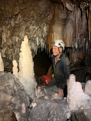 Caver amongst formations in Retdung Khur, Meghalaya